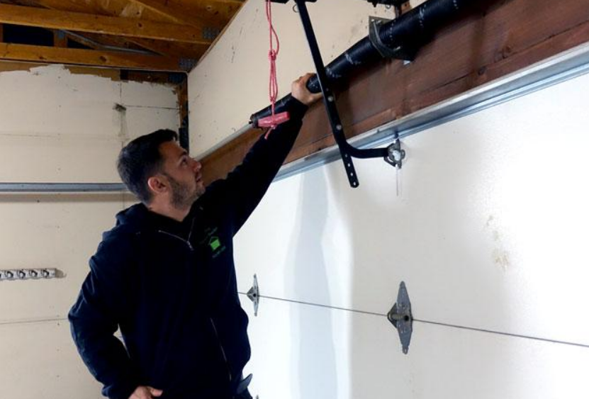 Garage door spring repair service by Clintonville Garage Door Repair - ensuring smooth and safe operation for your garage doors.