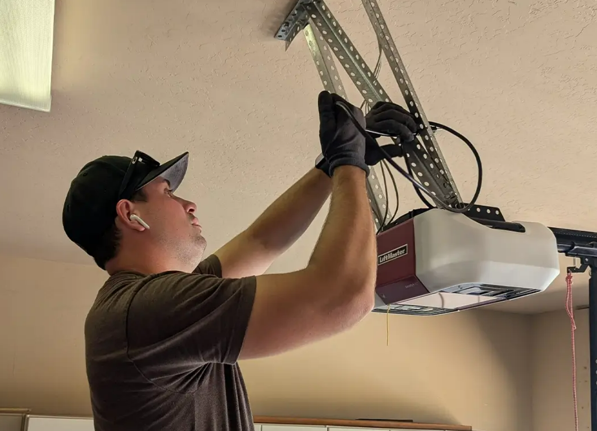 Experienced technicians performing garage door opener repair in Clintonville, ensuring smooth and reliable operation for your home.