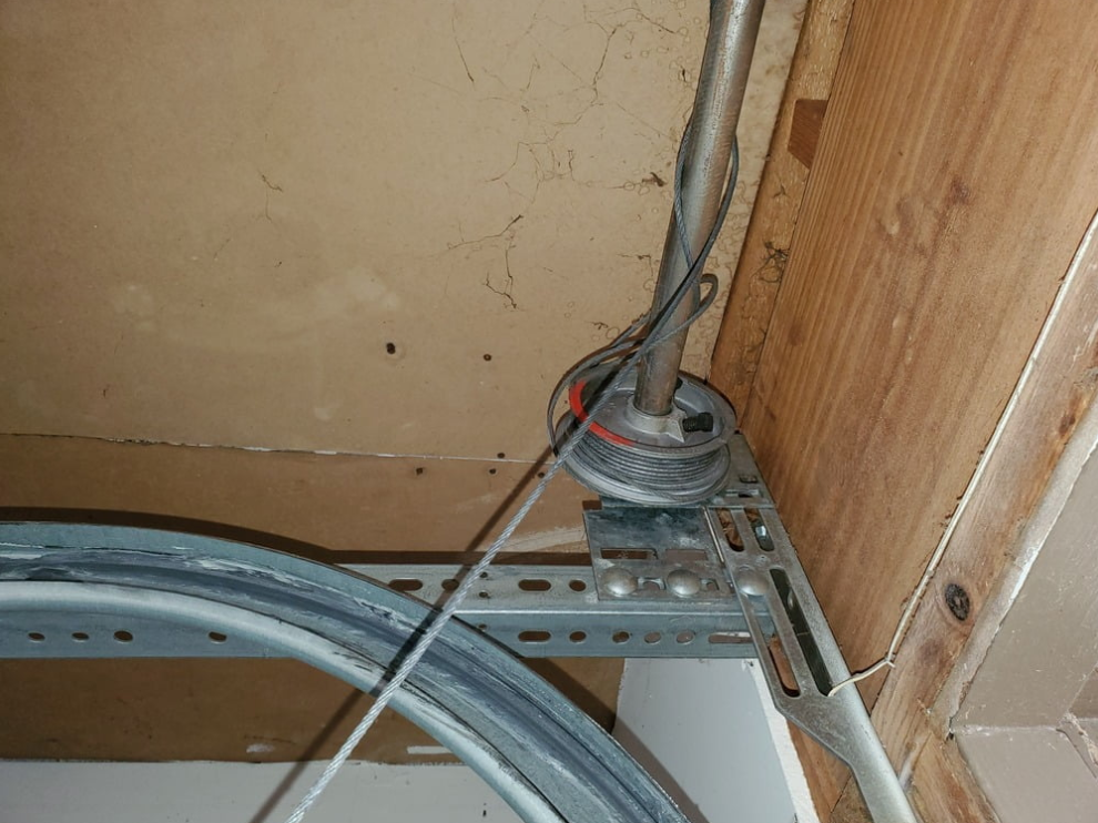 Off-Track Door Realignment & Cable Repair